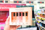 hand holding mix bar discovery set in cvs
