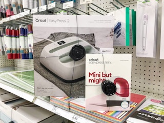 two cricut machine boxes on store shelf