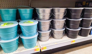 mainstays citronella candle buckets on shelf