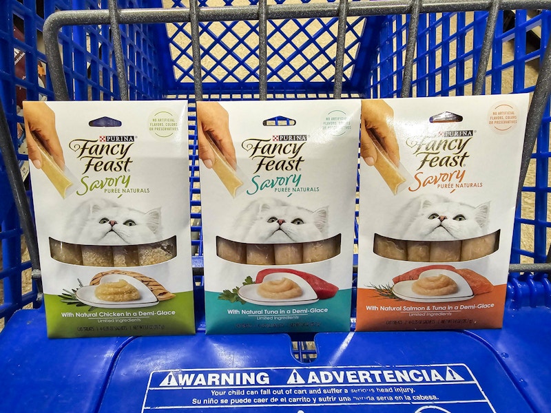 3 fancy feast puree cat treats in a cart
