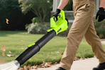a man using a leaf blower