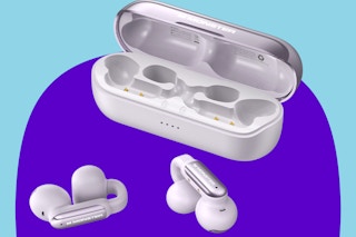 Monster clip on earbuds on a blue and purple background.