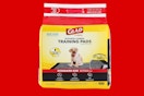 a bag of puppy pads on a red background