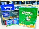 kleenex and claritin products with a walgreens shopping basket