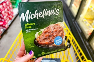 hand holding a michelinas frozen entree