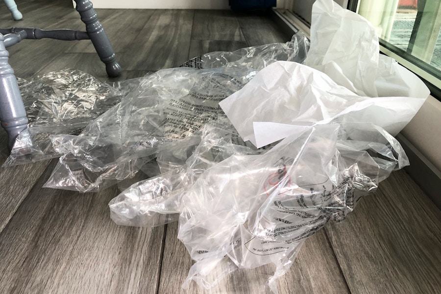 A pile of packaging from an amazon wardrobe box.