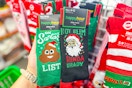 hand holding up christmas socks at dollar tree