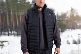 Man wearing the Soleilwear Mens Heated Vest outdoors.