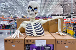 giant ground breaking skeleton display in store