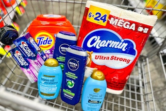 tide pods, crest toothpaste, ogx shampoo, nivea body wash, and charmin toilet paper in a cart