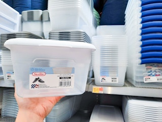 Six-Quart Sterilite Storage Box held in front of shelf at Walmart