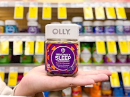 hand holding olly sleep gummies in cvs