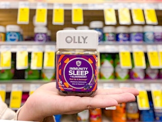 hand holding olly sleep gummies in cvs