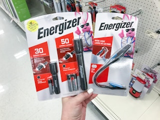 hand holding energizer lights at target