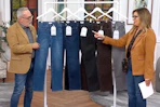 a woman and man showcasing jeans