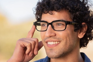 A man modeling black Echo frames