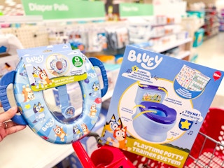 2 Bluey Potty Training Accessories in Target shopping cart