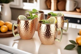 Set of four Moscow mule mugs.