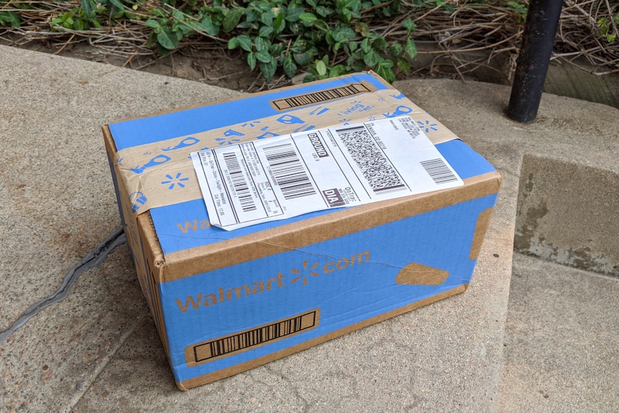 A Walmart package sitting on a doorstep