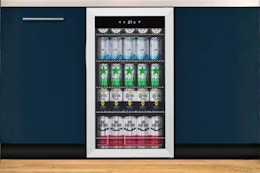 the Tylza Beverage Refrigerator installed in a kitchen with blue cabinets