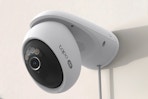 Tapo 4K 8MP Wired Pan/Tilt Outdoor Security Camera mounted on an outdoor wall.