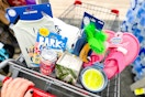 sandals, pet toys, candles, and more items in a cart