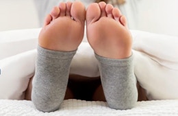 grey heels sock on a person's feet