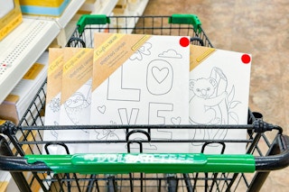 dollar tree canvases in a shopping cart