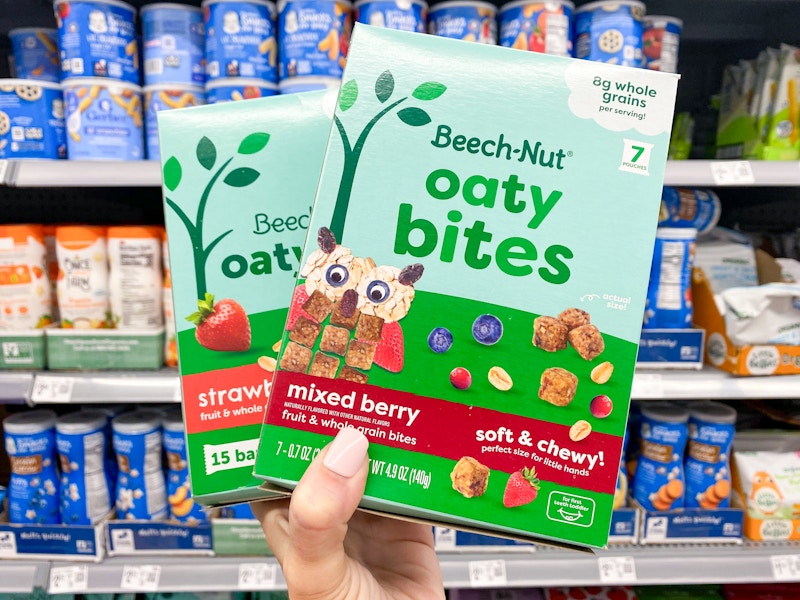 hand holding two boxes of beech-nut oaty bites and bars in walmart baby aisle