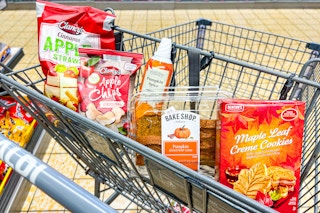 aldi fall pumpkin and apple flavor treats chips straws pumpkin spice whipped topping pumpkin sliced cake maple leaf cookies in cart