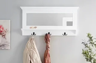 Lifestyle image of white Stylewell Floating Shelf hung on wall