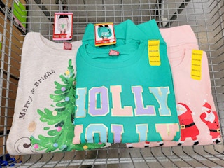 holiday sweatshirts in a cart