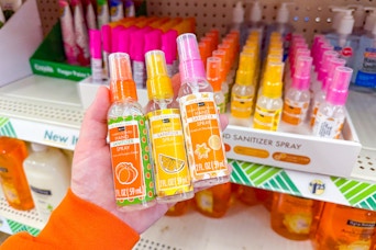 hand holding bpure fall hand sanitizer sprays at dollar tree