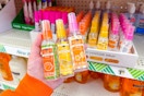 hand holding bpure fall hand sanitizer sprays at dollar tree
