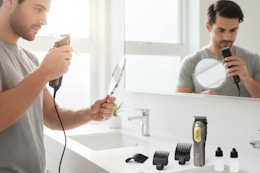 a man using a clippers set