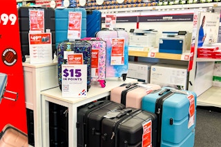 various pieces of luggage on display in staples