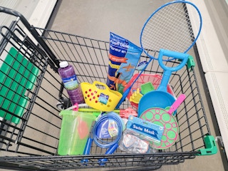 cart full of outdoor toys