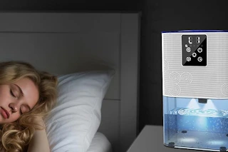 a woman sleeping near a dehumidifier