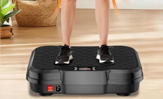 a person standing on a vibration plate machine