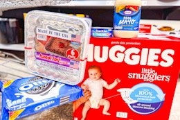 kraft, huggies, handi-foil, oreos, starkist in a shopping cart