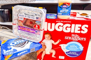 kraft, huggies, handi-foil, oreos, starkist in a shopping cart
