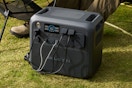 BLUETTI AC200L Portable Power Station next to a campsite.