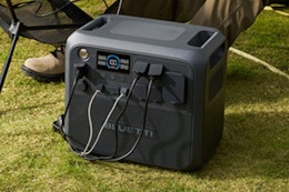 BLUETTI AC200L Portable Power Station next to a campsite.