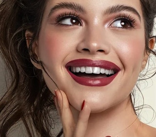 A woman wearing false eyelashes.