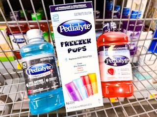 Pedialyte drinks and freezer pops in a Walmart cart