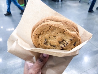 costco double chocolate chunk cookie held in hand