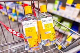 2 bottles of dickinsons toner in a cart