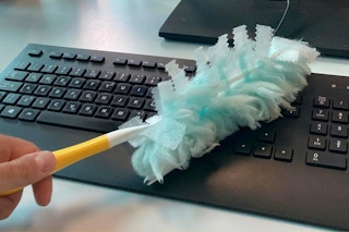 Swiffer Dusters Multi-Surface Refills being used on keyboard