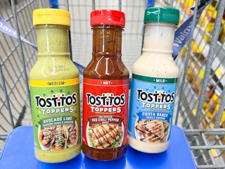 three Tostitos Topper bottles inside shopping cart