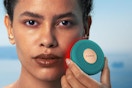 a woman using a foreo device